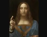 The Salvator Mundi painting depicts Christ with long, curly hair, raising his right hand in a blessing gesture and holding a crystal orb in his left.